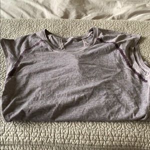 Lululemon top in a purple/grey color with cutouts